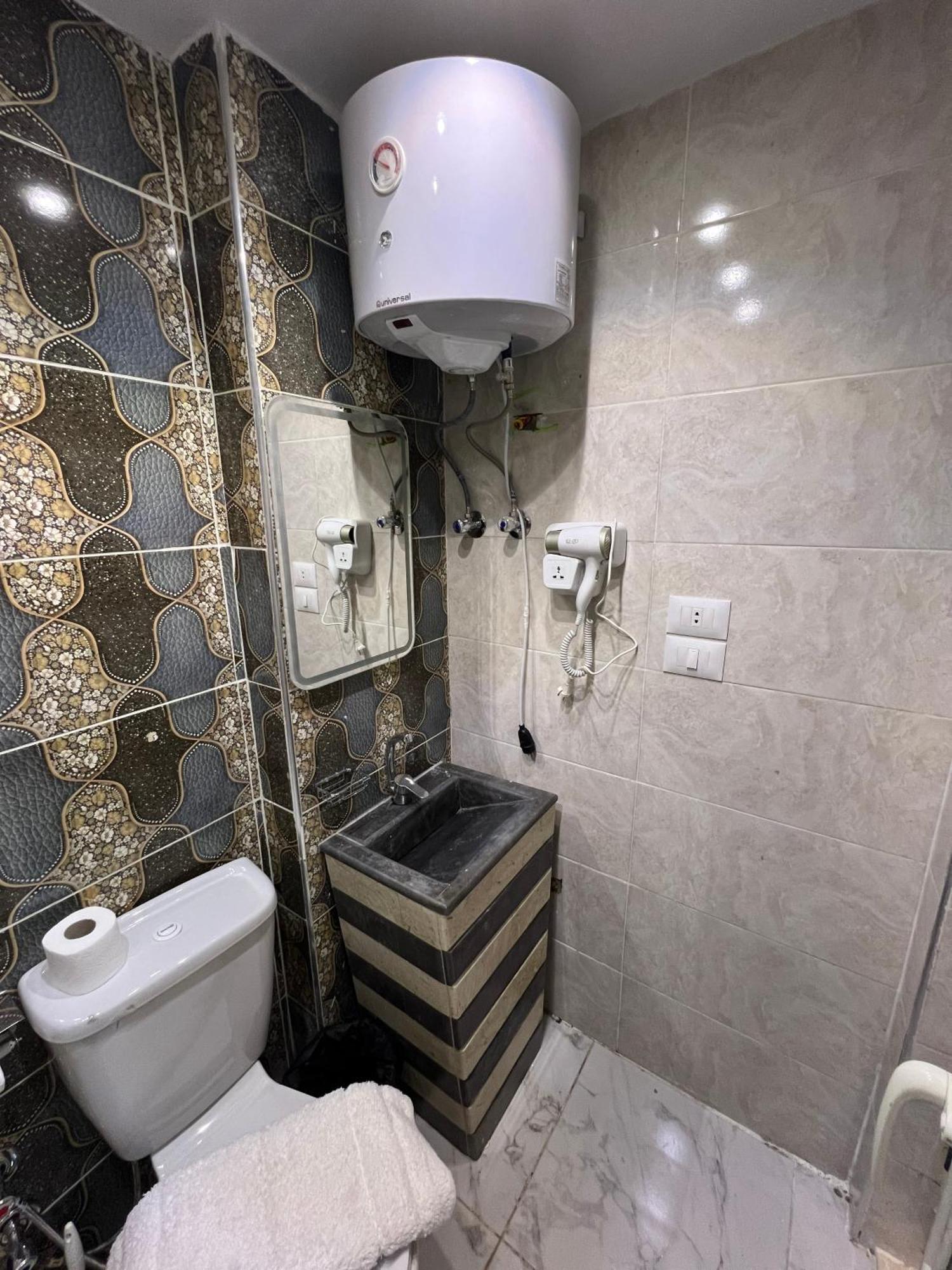 Kafret el-Gabal Isis Pyramids View Inn מראה חיצוני תמונה
