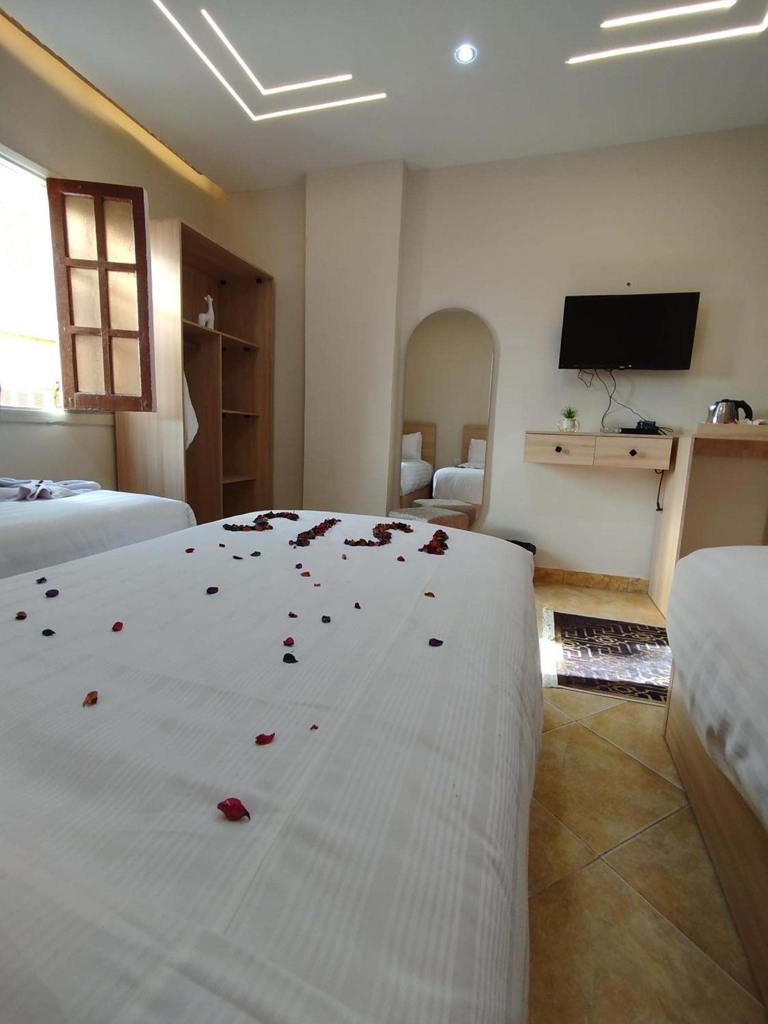 Kafret el-Gabal Isis Pyramids View Inn מראה חיצוני תמונה